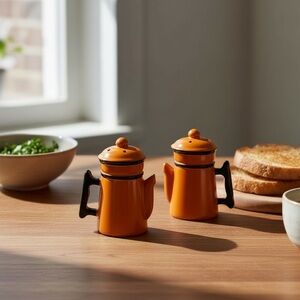 Vintage 60’s Ceramic Salt & Pepper Shakers In Orange / Black